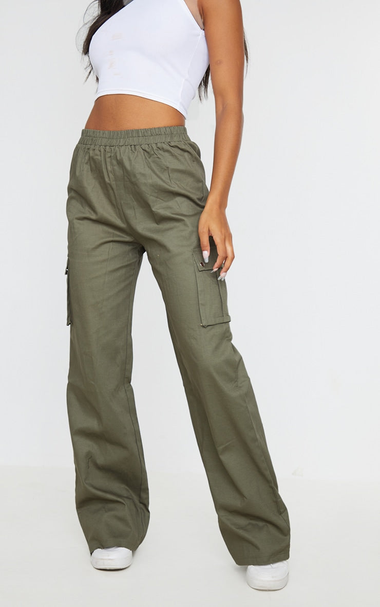 https://cdn-img.prettylittlething.com/7/3/0/3/7303a6a6fcae15a6078e3a3bc3d68c7206e93130_CMO6593_2_khaki_wide_leg_high_waisted_cargo_trousers.jpg